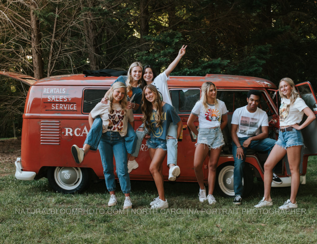 Charlotte North Carolina High School Senior Model Rep Team large group poses with vintage vw bus