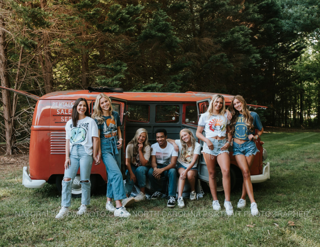 Charlotte North Carolina High School Senior Model Rep Team large group poses with vintage vw bus