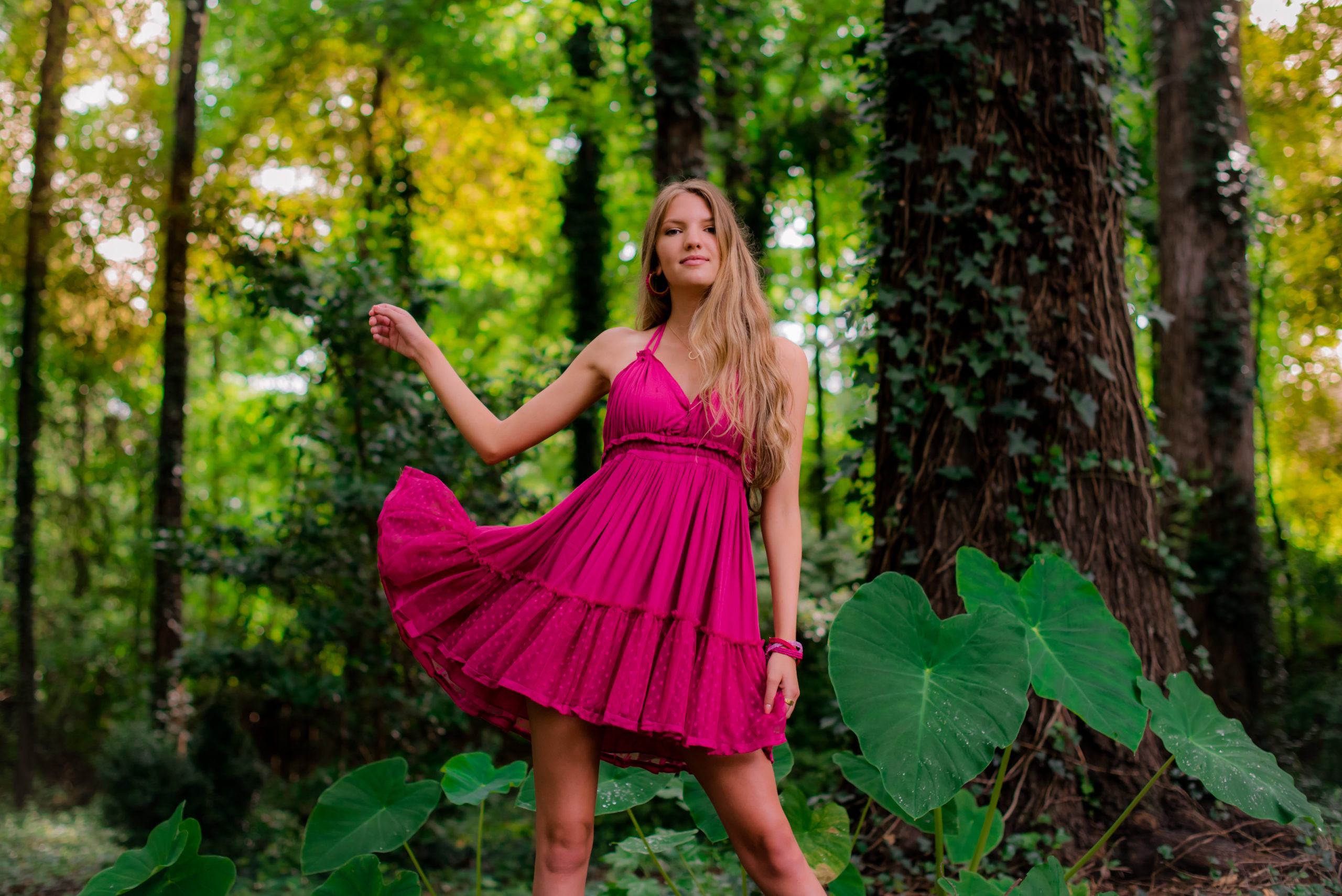 hot pink barbiecore dress in natural park